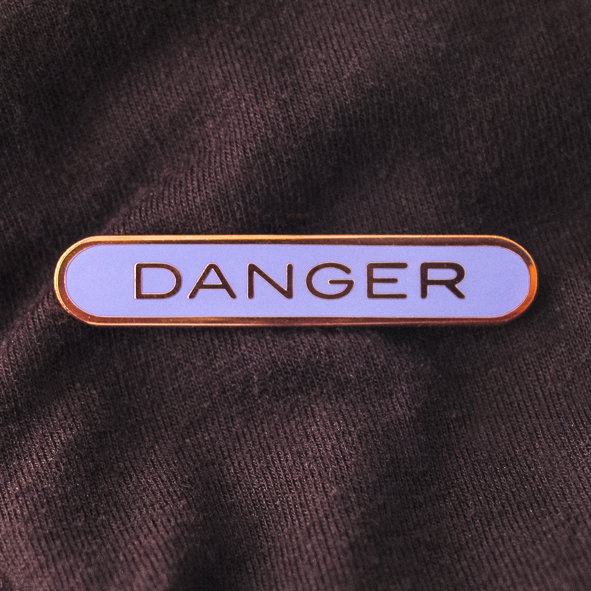 DANGER_pin_lavender_square
