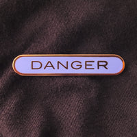 DANGER_pin_lavender_square